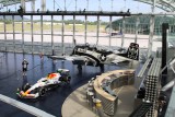 Hangar-7 showcases a Red Bull T-28 aircraft and Formula 1 car in its spectacular glass atrium.